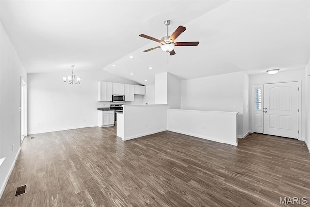 912 Gimli Ln, Wright City, MO 63390 - unfurnished living room featuring a chandelier, lofted ceiling, a ceiling fan, dark wood finished floors, and recessed lighting