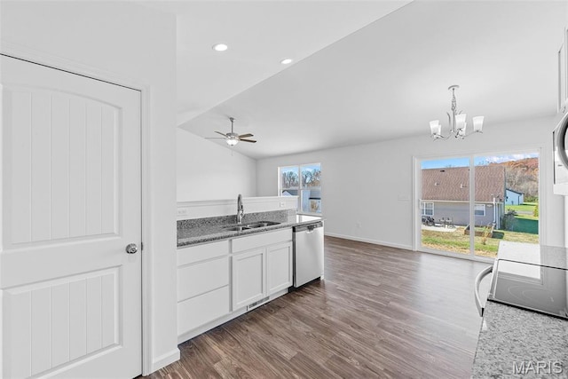912 Gimli Ln, Wright City, MO 63390 - kitchen featuring dishwasher, dark wood-type flooring, a chandelier, white cabinetry, and recessed lighting