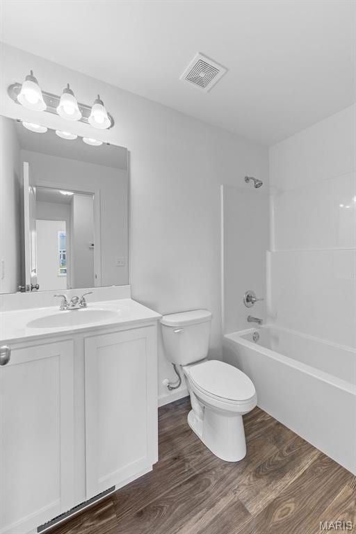 912 Gimli Ln, Wright City, MO 63390 - bathroom featuring wood finished floors, vanity, and shower / tub combination