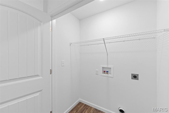 912 Gimli Ln, Wright City, MO 63390 - laundry room with electric dryer hookup, hookup for a washing machine, and dark wood-type flooring