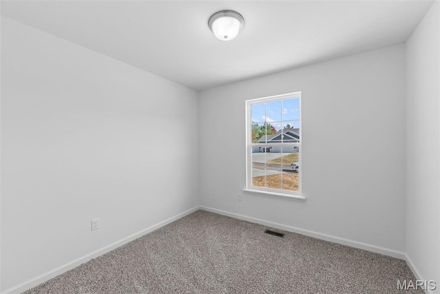 912 Gimli Ln, Wright City, MO 63390 - carpeted empty room with baseboards