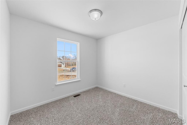 912 Gimli Ln, Wright City, MO 63390 - empty room with carpet flooring and baseboards