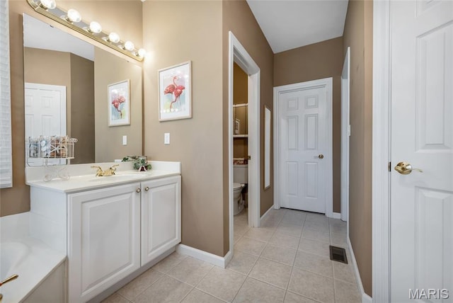 112 Wake Forest Pl, Ofallon, MO 63368 - full bath with vanity, tile patterned flooring, and a garden tub