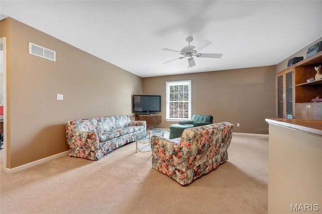 112 Wake Forest Pl, Ofallon, MO 63368 - carpeted living area featuring baseboards and ceiling fan