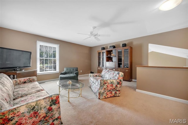 112 Wake Forest Pl, Ofallon, MO 63368 - carpeted living area featuring ceiling fan and baseboards