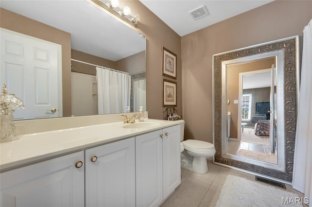 112 Wake Forest Pl, Ofallon, MO 63368 - bathroom with tile patterned floors, vanity, and a shower with curtain