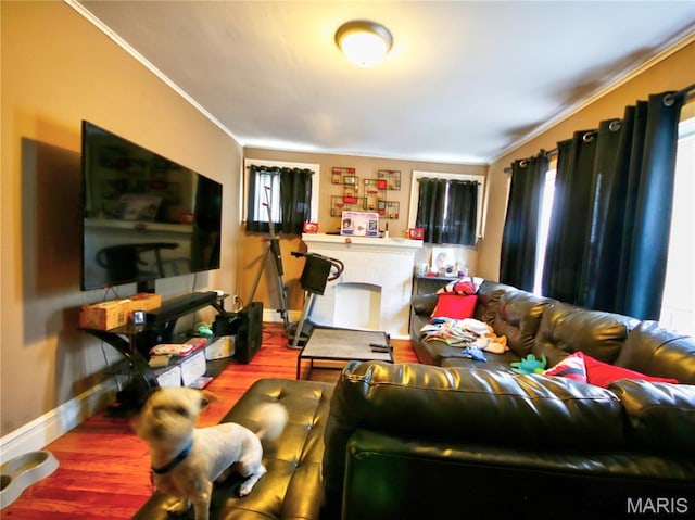 5912 Arsenal St, Saint Louis, MO 63139 - living area featuring wood finished floors and crown molding