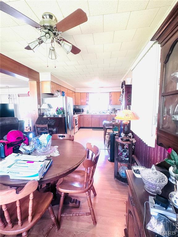 1620 N Jefferson St, Mexico, MO 65265 - dining space with a ceiling fan and light wood-style floors