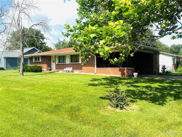 1620 N Jefferson St, Mexico, MO 65265 - single story home featuring a front yard and brick siding