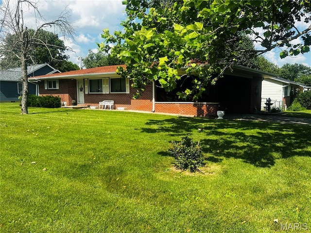 1620 N Jefferson St, Mexico, MO 65265 - single story home with a front yard and brick siding
