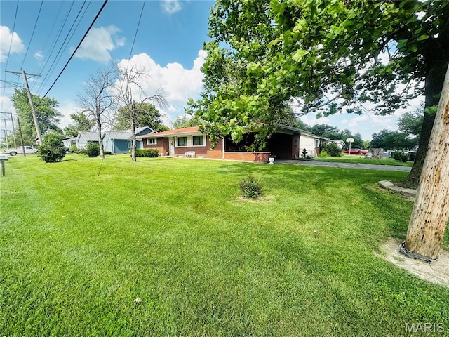 1620 N Jefferson St, Mexico, MO 65265 - view of grassy yard with asphalt driveway