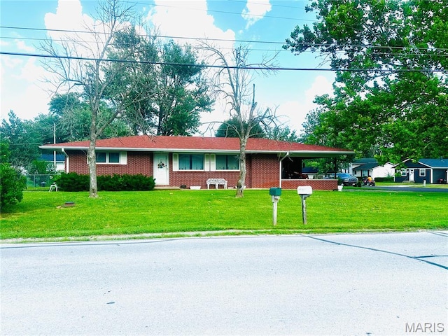 1620 N Jefferson St, Mexico, MO 65265 - single story home featuring a front lawn