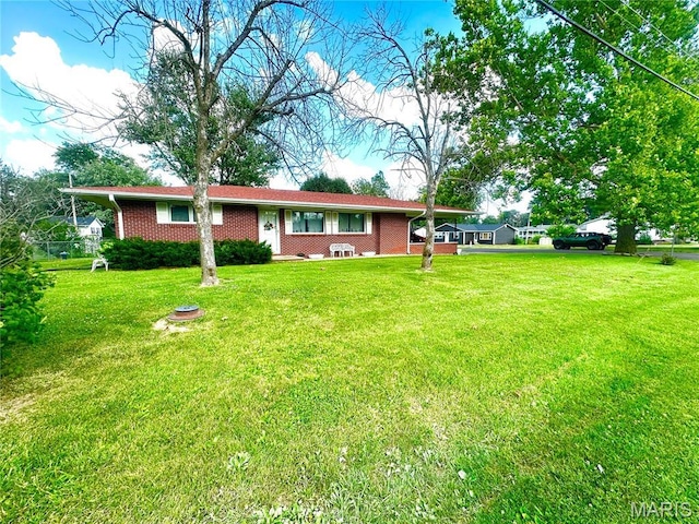 1620 N Jefferson St, Mexico, MO 65265 - ranch-style home with a front yard and brick siding