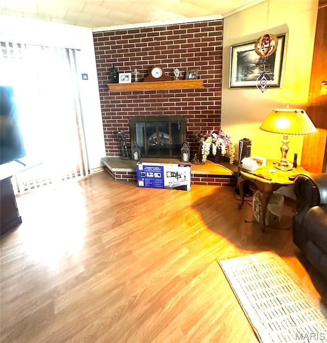 1620 N Jefferson St, Mexico, MO 65265 - living room with a brick fireplace and wood finished floors