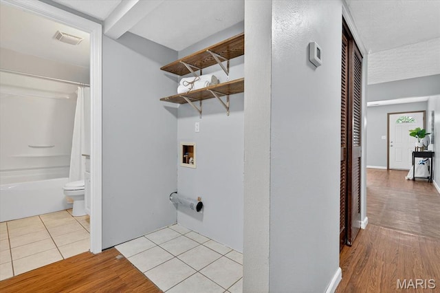 117 1st Ave, Edwardsville, IL 62025 - laundry room featuring hookup for a washing machine and wood finished floors