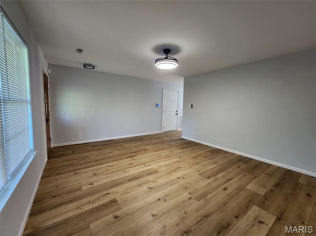 1604 Napoleon Dr, Bonne Terre, MO 63628 - empty room with wood-type flooring and baseboards