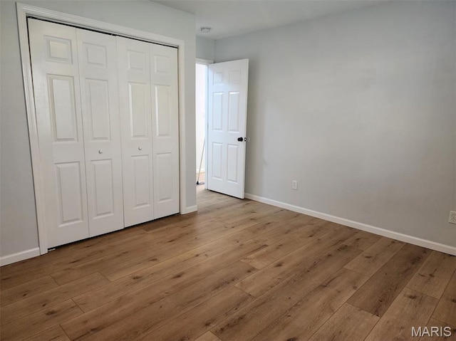 1604 Napoleon Dr, Bonne Terre, MO 63628 - unfurnished bedroom with wood-type flooring and a closet
