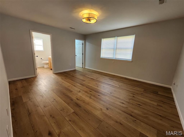 1604 Napoleon Dr, Bonne Terre, MO 63628 - unfurnished room with hardwood / wood-style flooring and baseboards