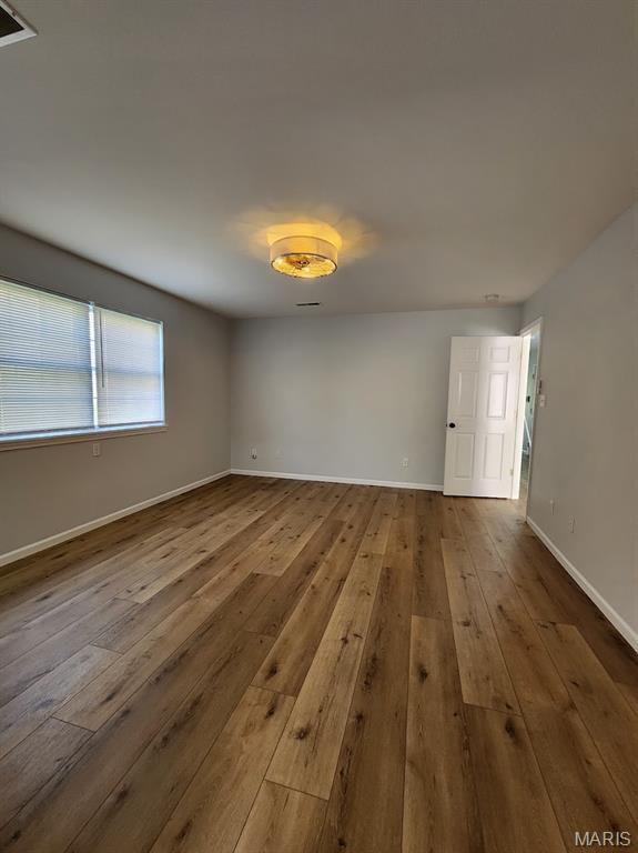 1604 Napoleon Dr, Bonne Terre, MO 63628 - unfurnished room with hardwood / wood-style floors and baseboards