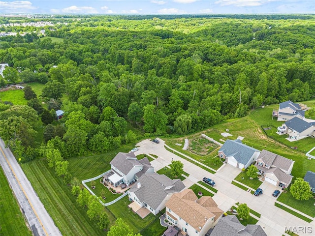 524 Pleasant Breeze Dr, Wentzville, MO 63385 - aerial view of residential area featuring a forest