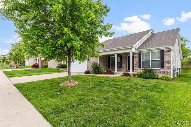 524 Pleasant Breeze Dr, Wentzville, MO 63385 - view of front facade featuring concrete driveway, brick siding, a garage, a shingled roof, and covered porch