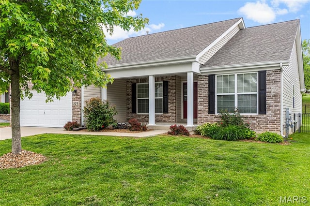 524 Pleasant Breeze Dr, Wentzville, MO 63385 - view of front of home featuring covered porch, brick siding, a garage, and roof with shingles