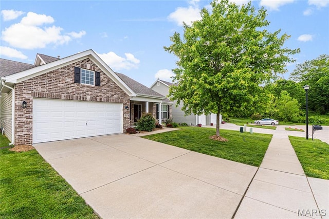 524 Pleasant Breeze Dr, Wentzville, MO 63385 - view of front of house featuring driveway, a front yard, brick siding, an attached garage, and a shingled roof