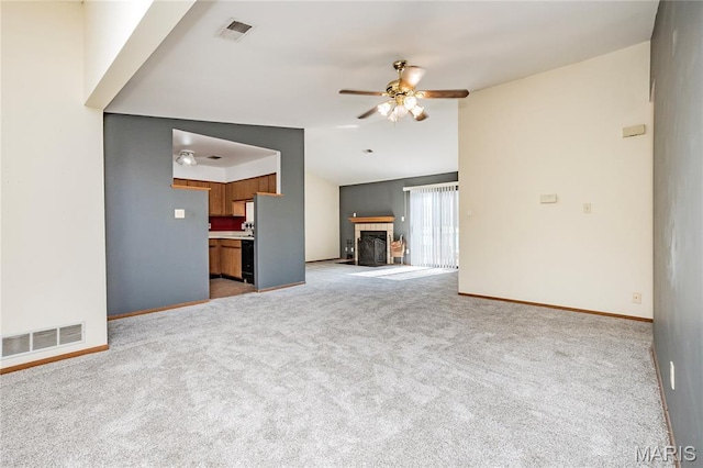 1756 Pineberry Ct, Creve Coeur Township, MO 63146 - unfurnished living room featuring a ceiling fan, light carpet, and a fireplace