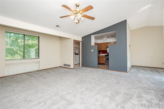 1756 Pineberry Ct, Creve Coeur Township, MO 63146 - unfurnished living room featuring a ceiling fan, light carpet, and vaulted ceiling