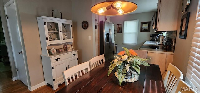 208 S Bast St, Jackson, MO 63755 - dining area with dark wood-style flooring