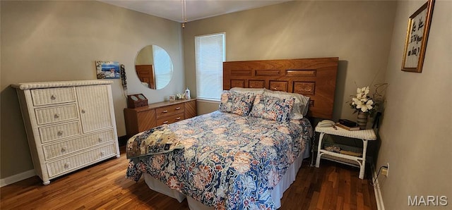 208 S Bast St, Jackson, MO 63755 - bedroom with dark wood-style floors and baseboards