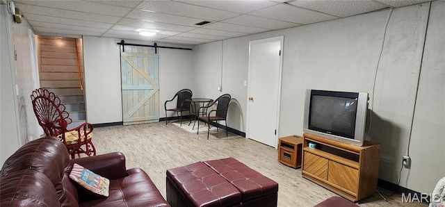 208 S Bast St, Jackson, MO 63755 - living area with a barn door and wood finished floors