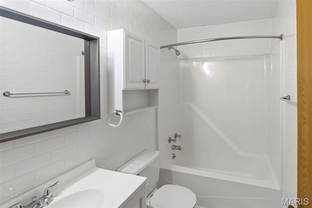 1520 Royal Oak Ct, Ofallon, IL 62269 - bathroom featuring shower / washtub combination, vanity, tile walls, and tasteful backsplash