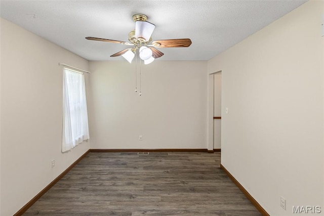 1520 Royal Oak Ct, Ofallon, IL 62269 - spare room with a ceiling fan and wood finished floors