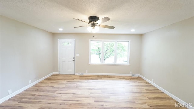 850 Cambridge Dr, Sikeston, MO 63801 - entrance foyer featuring light wood-type flooring, ceiling fan, recessed lighting, and a textured ceiling