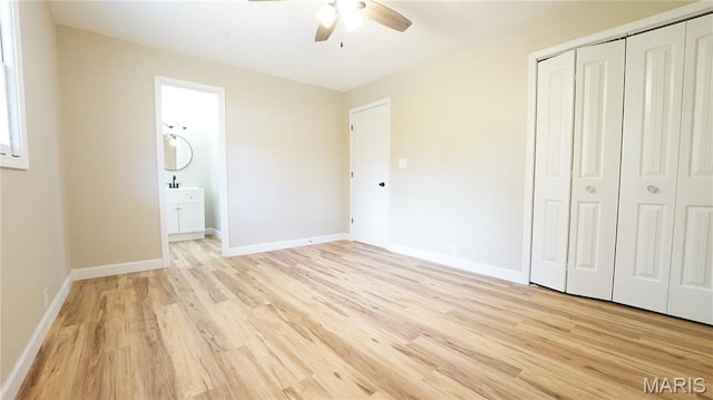 850 Cambridge Dr, Sikeston, MO 63801 - unfurnished bedroom with light wood finished floors, a closet, ensuite bath, and a ceiling fan