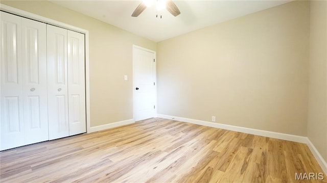 850 Cambridge Dr, Sikeston, MO 63801 - unfurnished bedroom featuring a closet, light wood finished floors, and ceiling fan