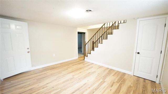 850 Cambridge Dr, Sikeston, MO 63801 - spare room with light wood finished floors and stairway