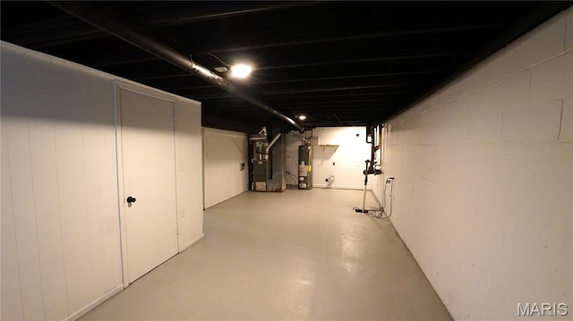 850 Cambridge Dr, Sikeston, MO 63801 - unfinished below grade area featuring water heater and heating unit