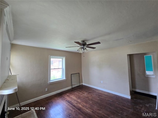 6203 Dardanella Ave, Normandy, MO 63121 - unfurnished living room featuring wood finished floors and ceiling fan