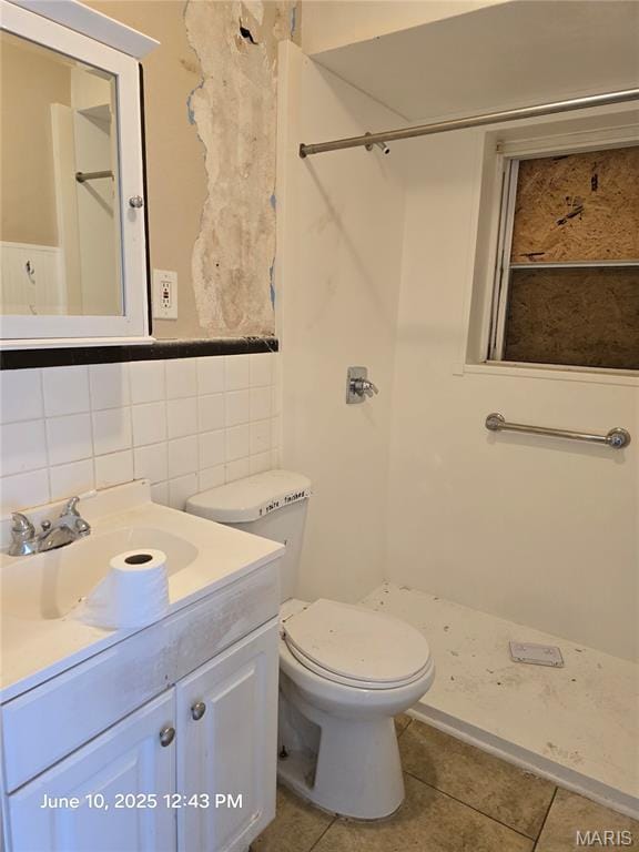 6203 Dardanella Ave, Normandy, MO 63121 - full bathroom with a stall shower, vanity, and tile patterned flooring