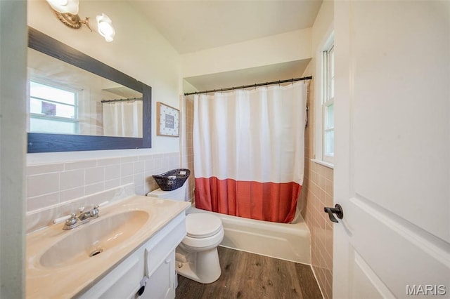 12575 State Route F, Rolla, MO 65401 - full bathroom with tile walls, vanity, shower / bathtub combination with curtain, and wood finished floors