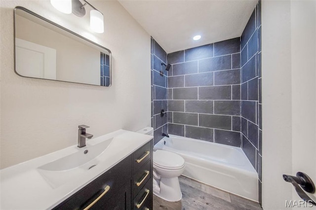 12575 State Route F, Rolla, MO 65401 - full bath featuring wood finished floors, vanity, shower / washtub combination, and recessed lighting