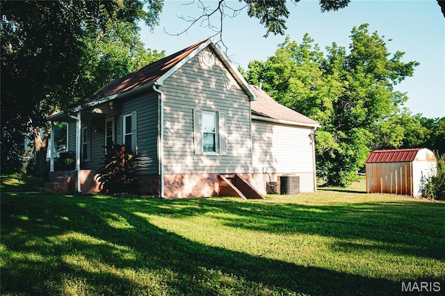 908 Birch St, Leadwood, MO 63653 - view of home's exterior featuring a storage shed and a lawn