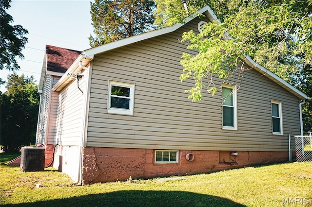 908 Birch St, Leadwood, MO 63653 - view of property exterior featuring a lawn and a central air condition unit