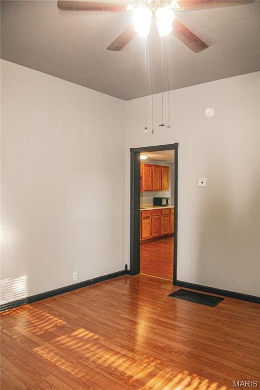 908 Birch St, Leadwood, MO 63653 - spare room featuring wood finished floors and ceiling fan