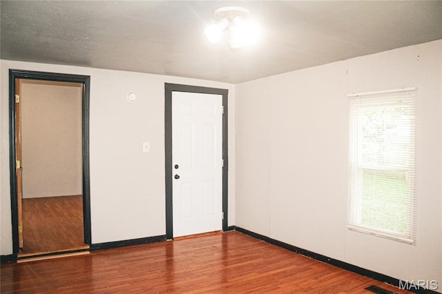 908 Birch St, Leadwood, MO 63653 - spare room featuring wood finished floors
