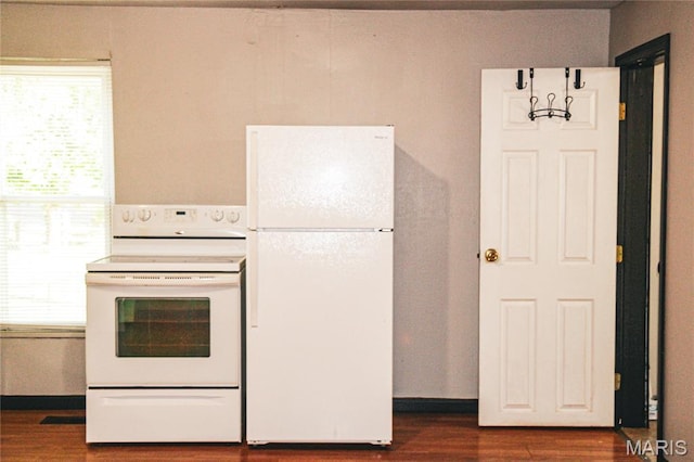 908 Birch St, Leadwood, MO 63653 - kitchen featuring white appliances and dark wood-style flooring