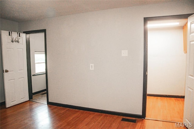 908 Birch St, Leadwood, MO 63653 - empty room featuring wood finished floors and baseboards