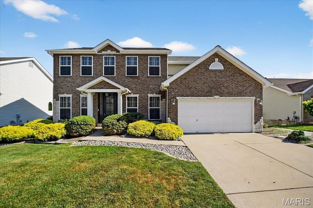 612 Thornridge Dr, Ofallon, MO 63368 - view of front facade with an attached garage, driveway, brick siding, and a front lawn